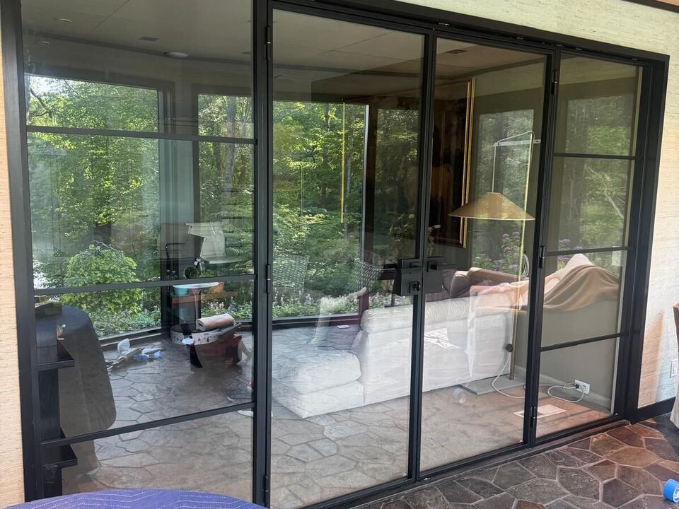 Sliding glass wall with a black grid